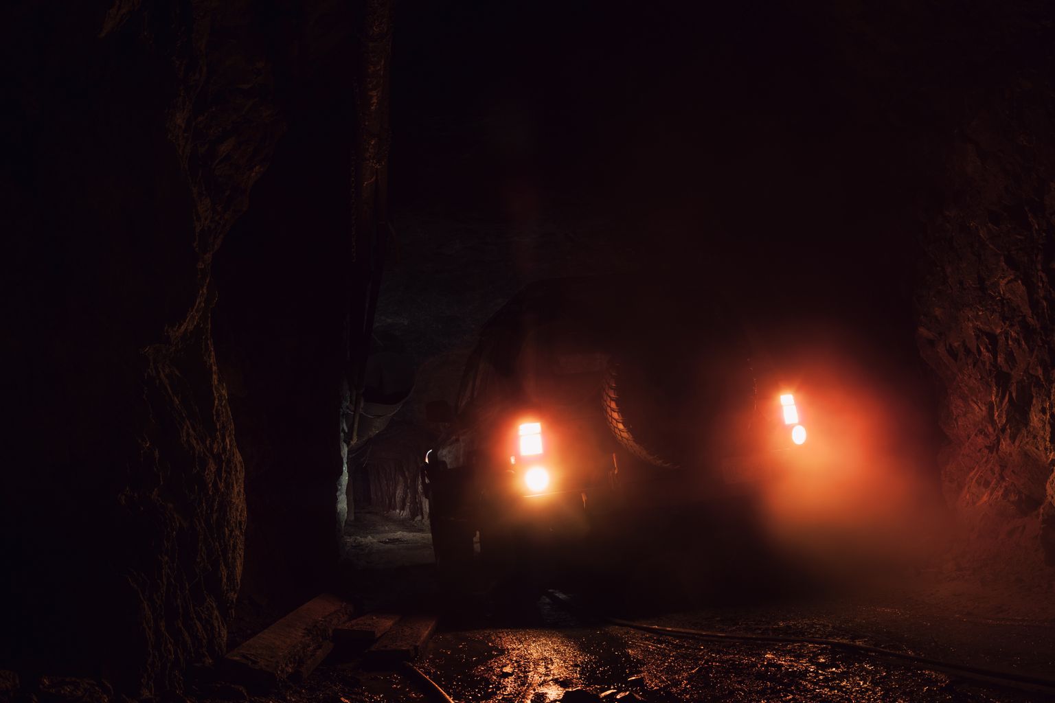 Loader loading a truck in an underground drive